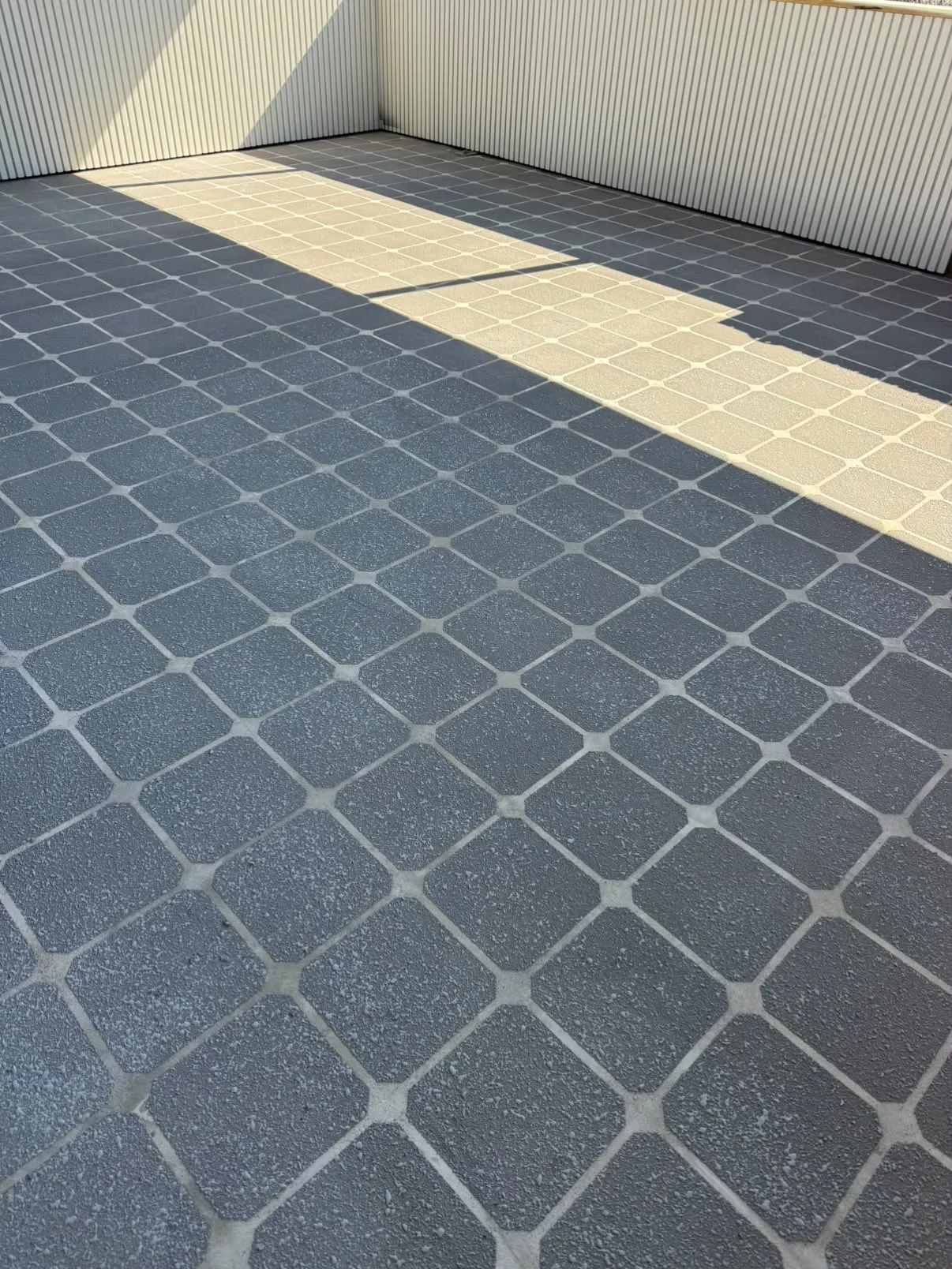 Balcony after stencilled spray pave resurfacing